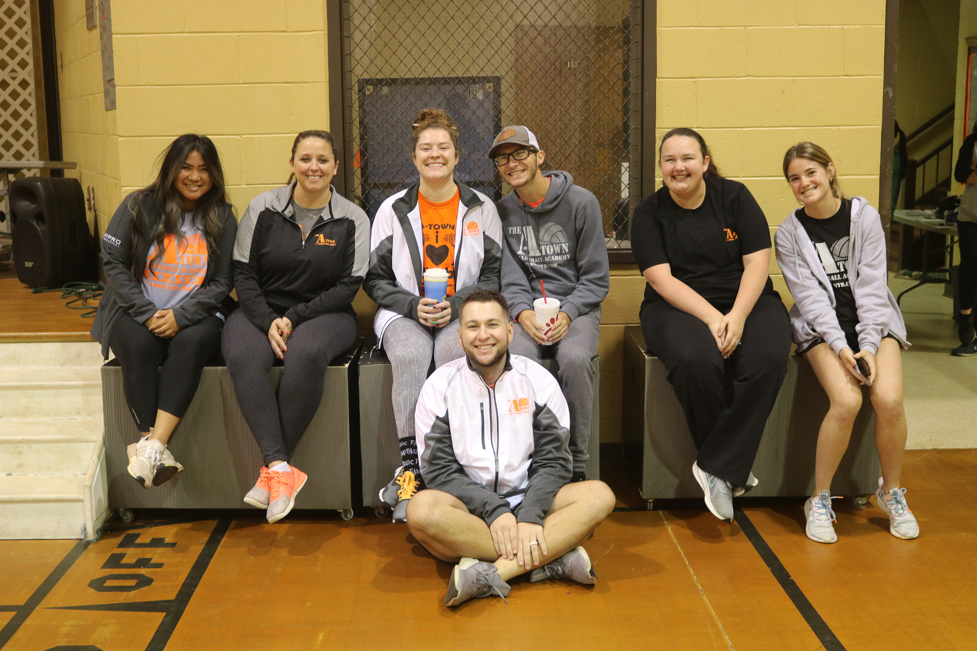 group of coaches smiling