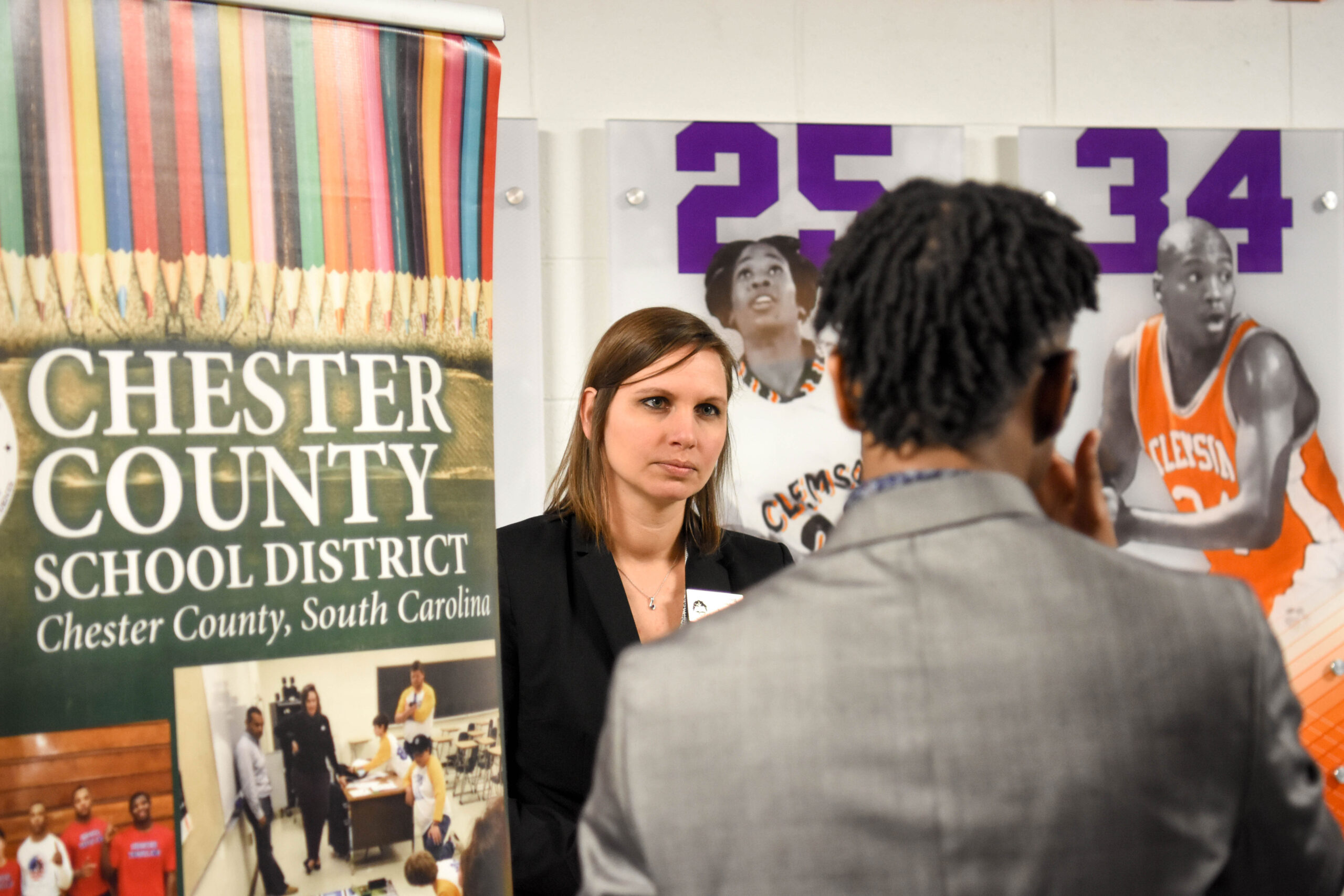 student talking to employer at career fair