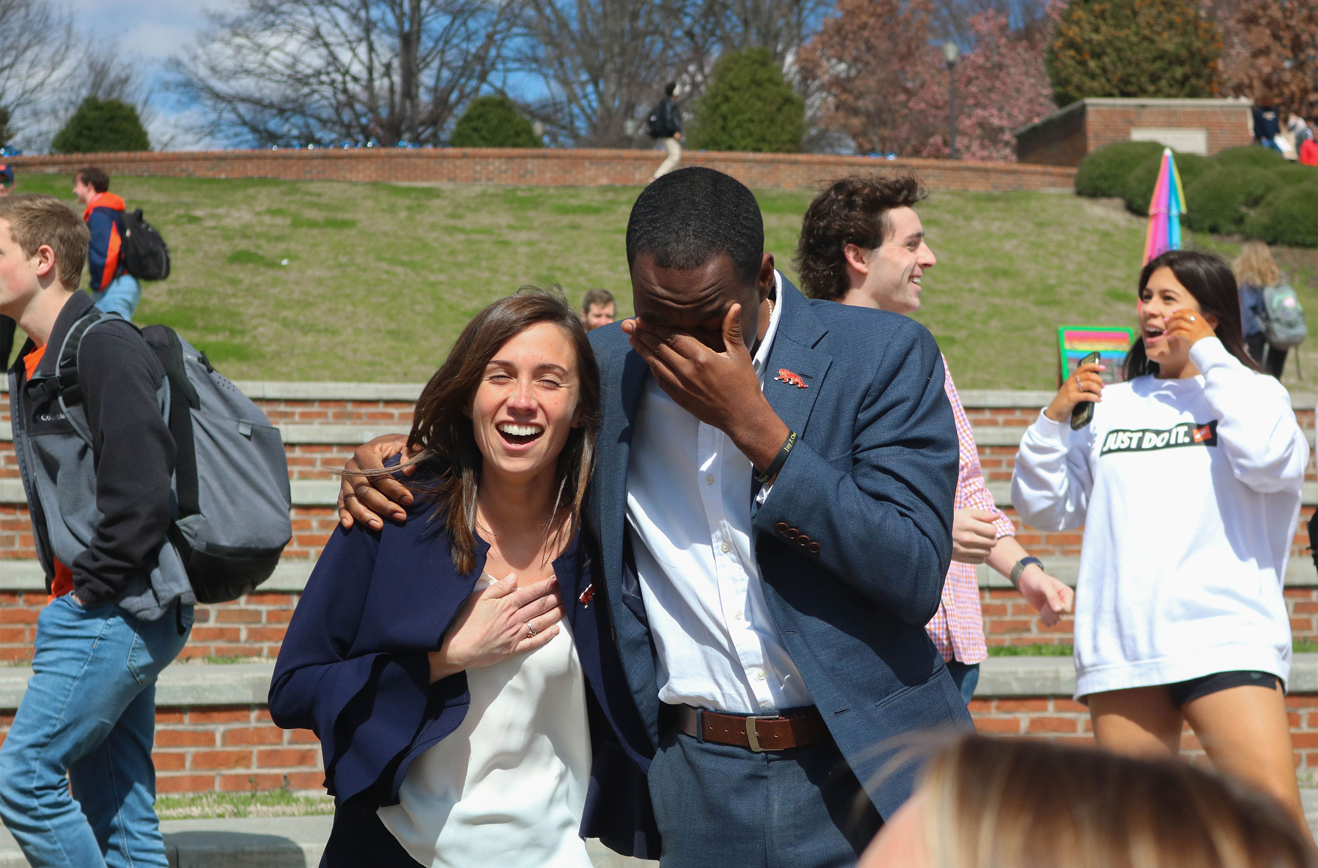 president crying while hugging vice president